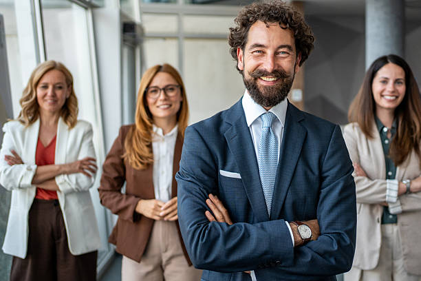 istock Diverse business team standing together in modern office 2241029889