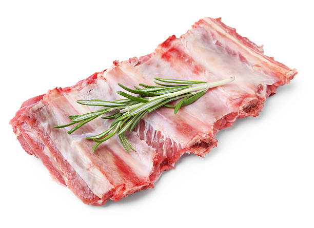 istock Fresh raw beef ribs and rosemary isolated on white 2241035451