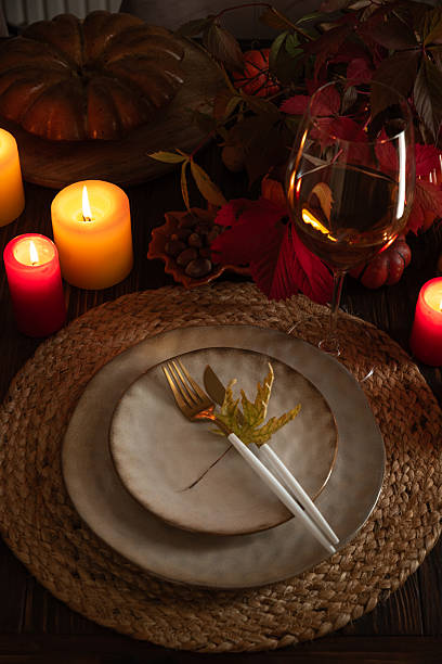 istock Autumn Table Setting with Plates, Wine, Pumpkins and Seasonal Decor 2241037899