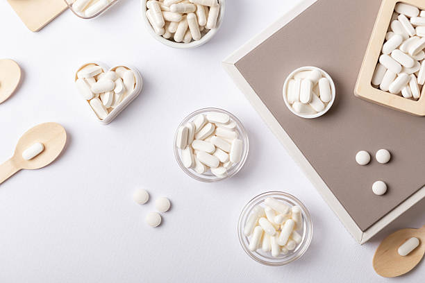 istock Organic dietary supplements, minerals and vitamins to protect immune system. Many pills, tablets, capsules. Healthy lifestyle. 2241039428