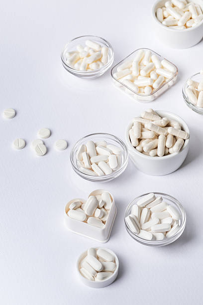 istock Organic dietary supplements, minerals and vitamins to protect immune system. Many pills, tablets, capsules. Healthy lifestyle. 2241039616