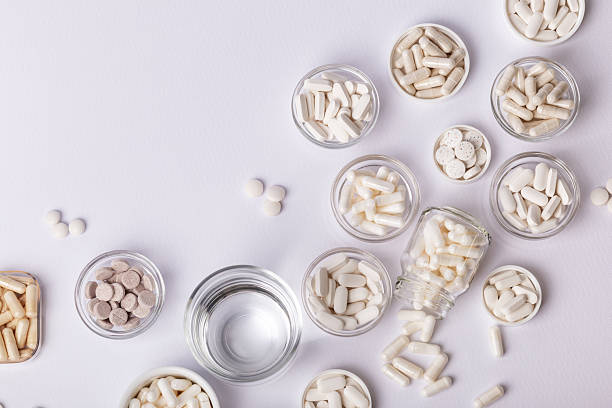 istock Organic dietary supplements, minerals and vitamins to protect immune system. Many pills, tablets, capsules. Healthy lifestyle. 2241039956