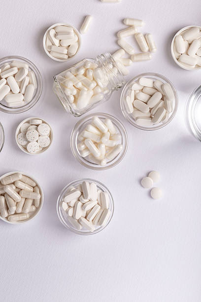istock Organic dietary supplements, minerals and vitamins to protect immune system. Many pills, tablets, capsules. Healthy lifestyle. 2241039993