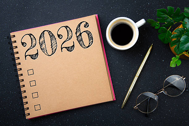 istock New year goals 2026 on desk. 2026 resolutions list with notebook, plant on black table. Resolutions, plan, goals, action, checklist, idea concept. New Year 2026 resolutions 2241044283