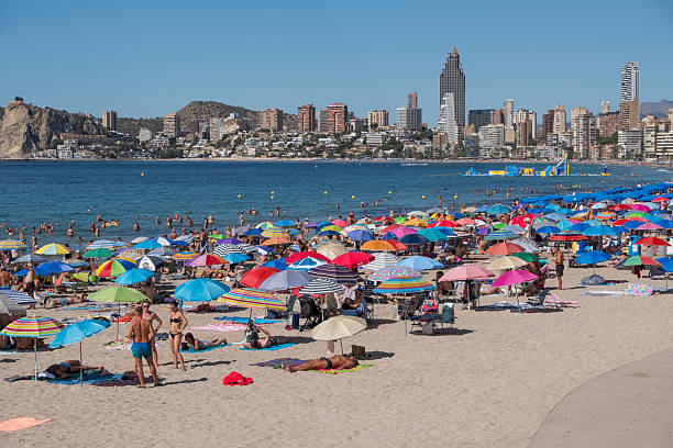 Alicante, Spain - September 1, 2025: Malpas Beach in Benidorm and skyscrapers