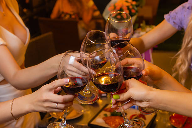 istock Clinking glasses with alcohol and toasting, party. 2241056853