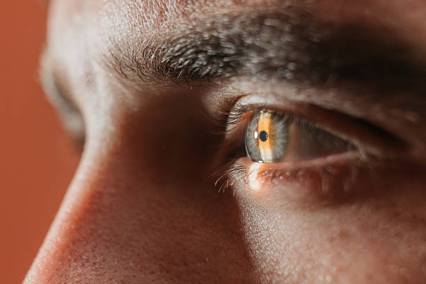 istock Male patient undergoing vision examination using slit lamp 2241061924