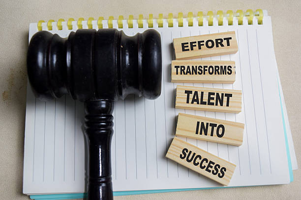istock Effort transforms talent into success on stacked wooden cubes on the table. Business and finance concept 2241069383