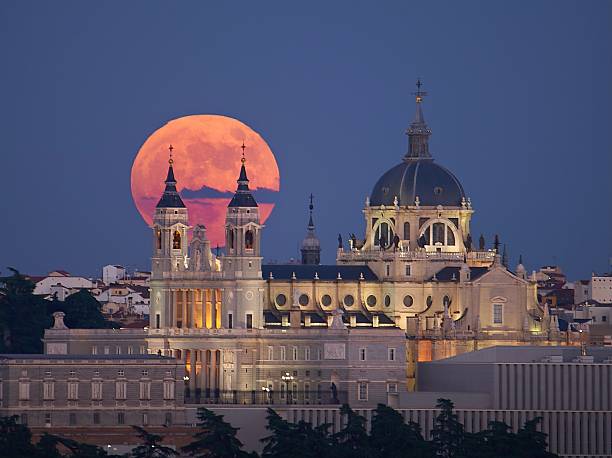 istock Full Moon Rising Behind Almudena Cathedral in Madrid, Spain 2241070413
