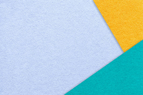 istock Abstract pastel blue, yellow and turquoise paper background with copy space. Template for presentation, banner 2241070494