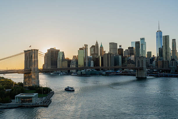 istock Brooklyn bridge with manhattan skyline at golden hour 2241072182