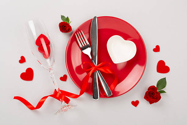 istock Table setting for Valentine's Day on color background, top view 2241072867