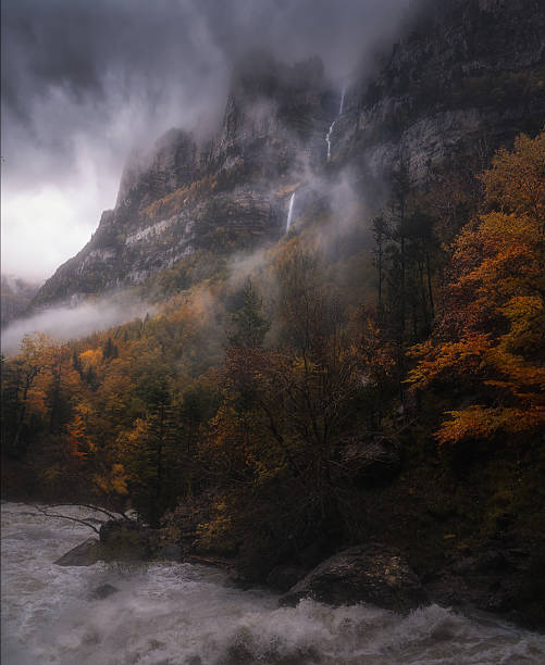 istock Misty Autumn Mountains and Waterfalls in Ordesa Valley, Spain 2241073245