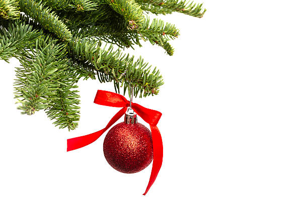 istock Christmas tree branches with festive decoration isolated on white 2241075085