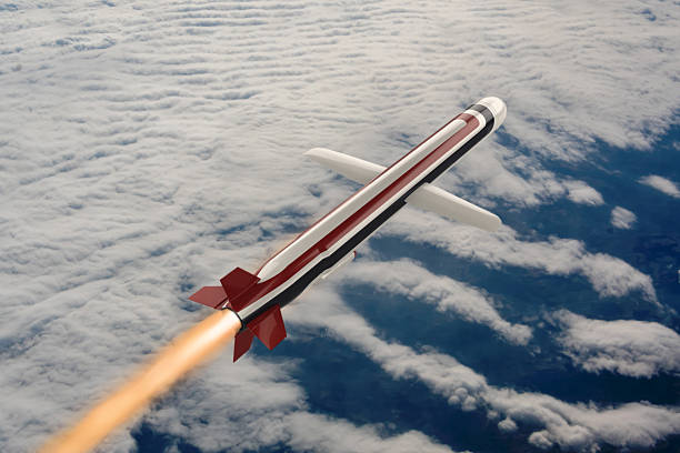 An American multi-purpose, high-precision subsonic cruise missile flies above the clouds,