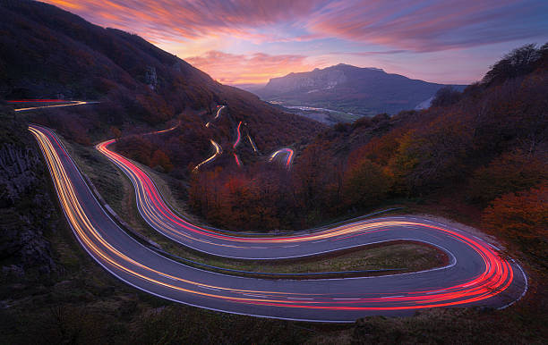 istock Light trails on the winding Urbasa mountain road at dusk, Navarra 2241076450