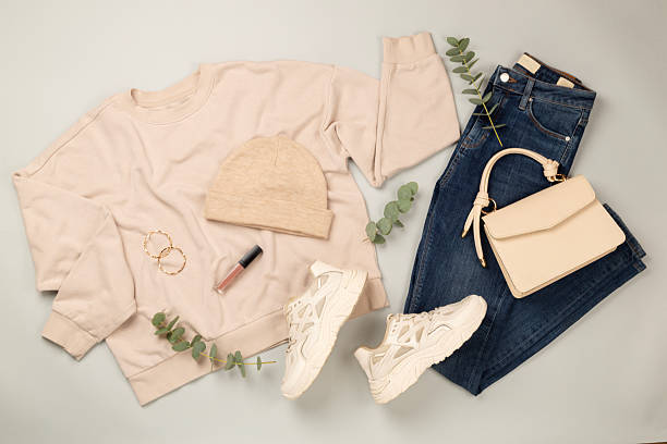 istock Flat lay with women's trendy spring outfit on gray background,, top view 2241076457