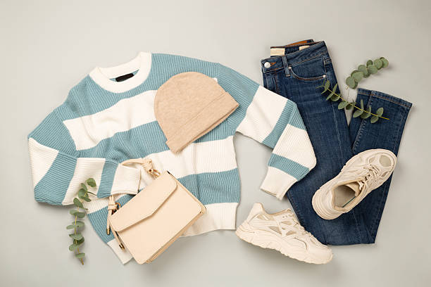 istock Flat lay with women's trendy spring outfit on gray background,, top view 2241076460