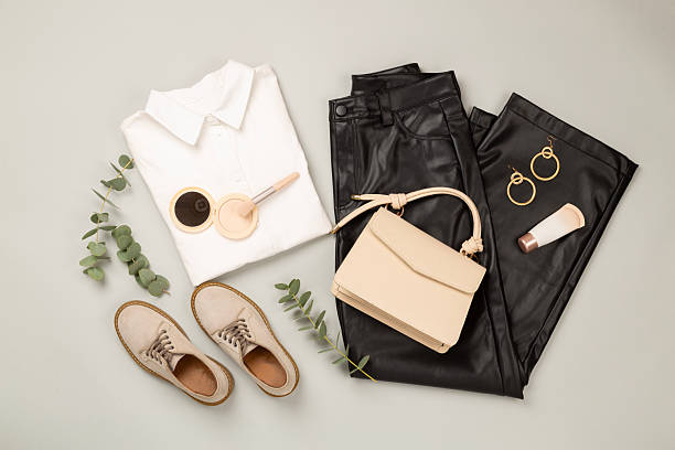 istock Flat lay with women's trendy spring outfit on gray background,, top view 2241076473