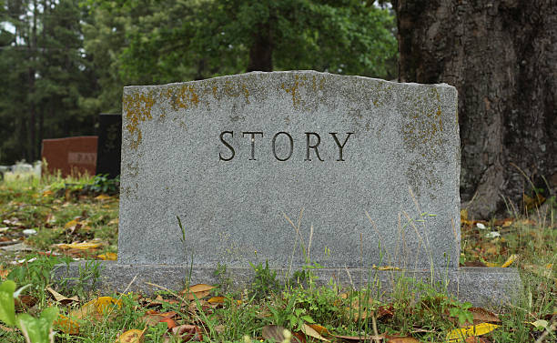 istock Headstone in Cemetery With Word Story 2241076834