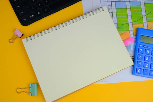 istock blank paper next to school tools with no word as a template for text space concept. business and education concept 2241084780