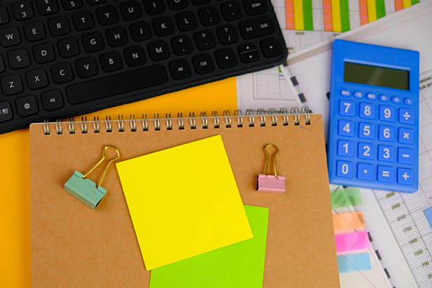 blank paper next to school tools with no word as a template for text space concept. business and education concept