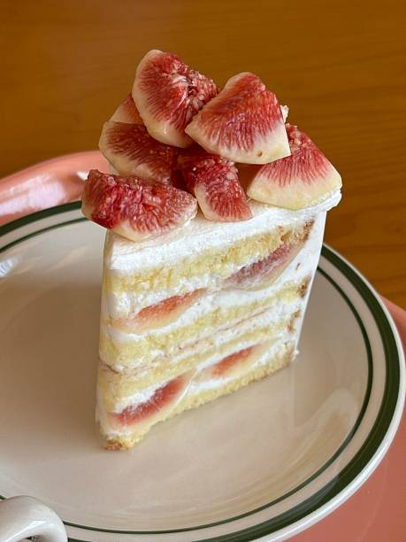 istock Strawberry cake with soft fluffy layers, topped with fresh strawberries and smooth cream, showcasing vibrant red fruit, delicate textures, and sweet inviting appearance in close-up detail 2241086431