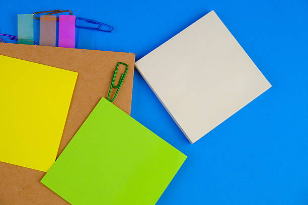 istock blank paper next to school tools with no word as a template for text space concept. business and education concept 2241088408