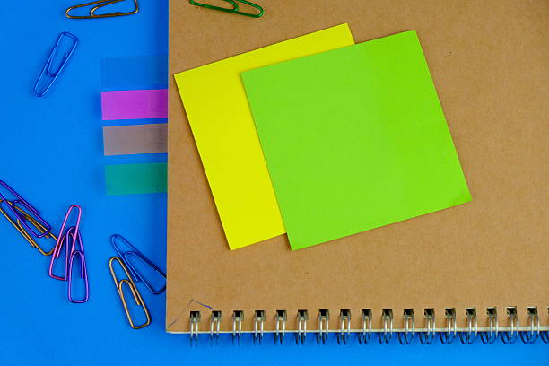 istock blank paper next to school tools with no word as a template for text space concept. business and education concept 2241088409