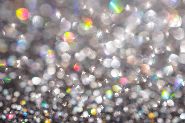 Shiny luxury glitter rainbow glow light flare with bokeh background