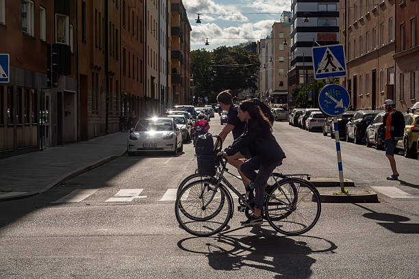 Stockholm, Sweden Aug 19, 2025 People biking on Gotlandsgatan on Sodermalm.