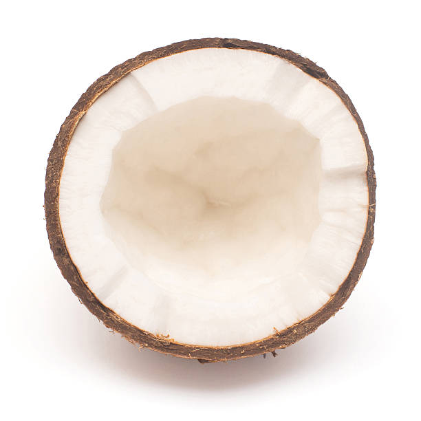 Coconut fruit half isolated on white background. Tropical, palm. Flat lay, top view