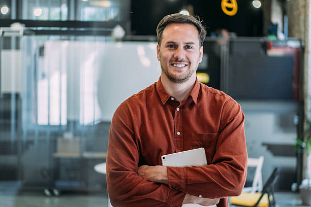 istock Confident businessman in modern office. 2241096269