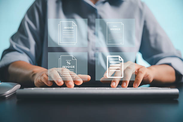 istock Businesswoman manages electronic statements, digital receipts on virtual screen, utilizing concept of e-invoice, digital billing, online invoice processing as smart e-tax and tax accounting solutions. 2241103526