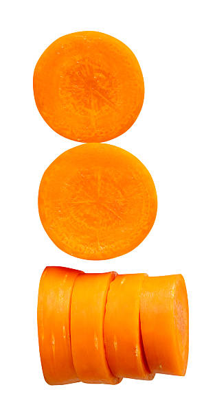 istock Side view of orange carrot slices in stack and set isolated on white background with clipping path 2241107367