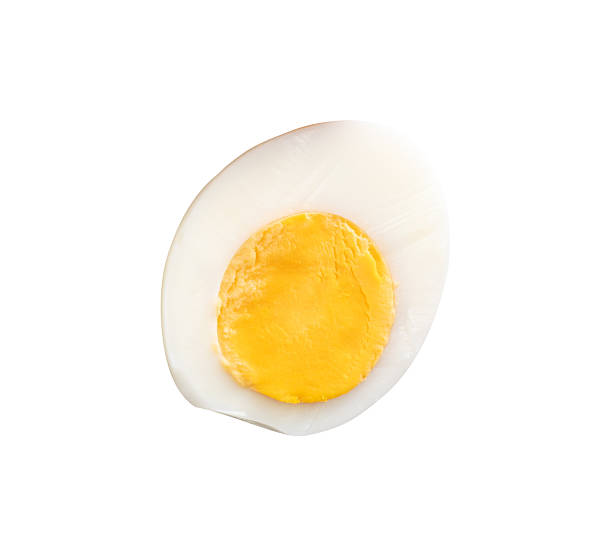 istock Top view of unpeeled cooked or boiled chicken eggs in a half with egg yolk isolated on white background with clipping path 2241109030