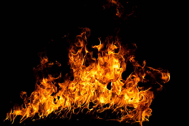 istock Fire flames isolated on black background. Fire burn flame isolated, flaming burning art design concept with space for text. 2241110145