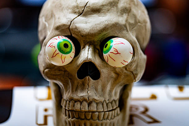 Halloween skull decorations. Halloween skull skeleton for decorated house. Scary skull Decorated at front yard of a American home. Trick or treat. Halloween skull background. Holiday of Halloween