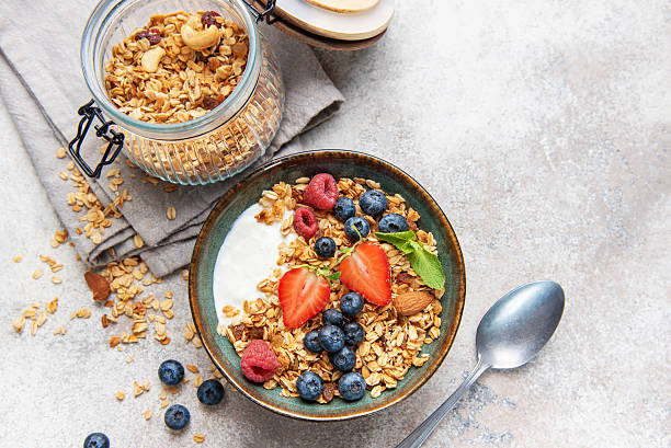 istock Healthy breakfast granola bowl with fresh berries 2241119742