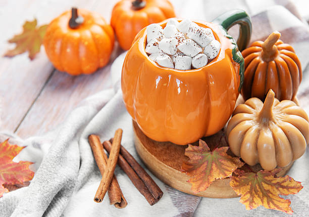 istock Pumpkin hot chocolate with marshmallows enjoying autumn season 2241120042