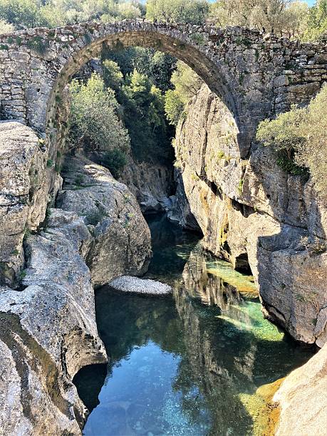 istock Old stone bridge over a river in Turkey 2241122561