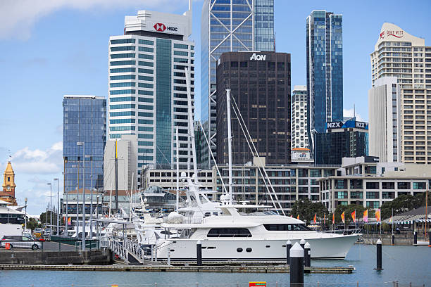 Auckland, New Zealand cityscape with harbour boats