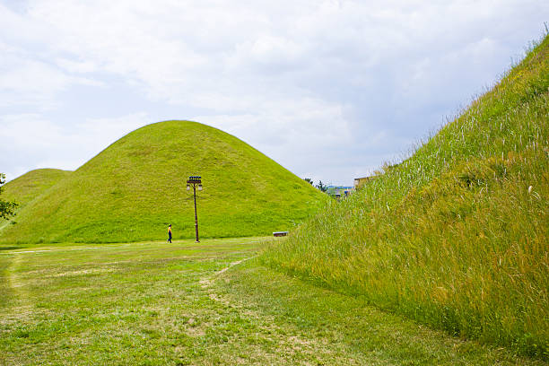 istock Tumuli park or Daereungwon tomb complex scenic view with several tumulus and green trees in Gyeongju, South Korea. 2241125939