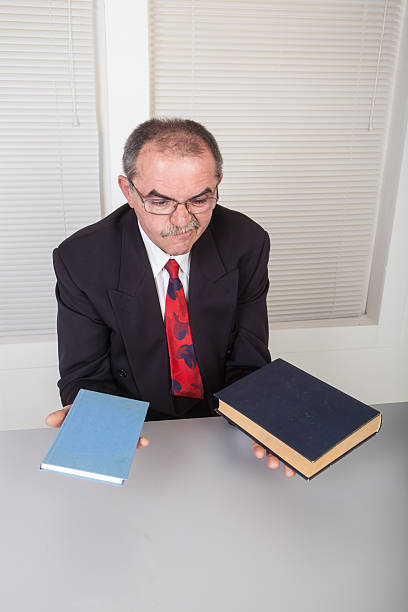 canadian attorney clowning around and banging the gavel on his head