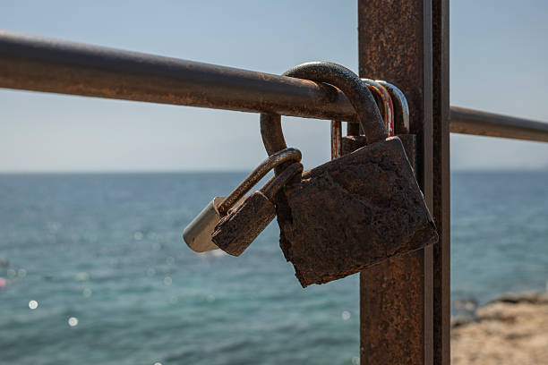 close-up of wish padlock on cultural totem