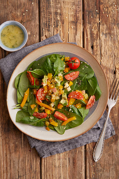 istock Spinach Salad with Avocado and Bell Pepper 2241130103