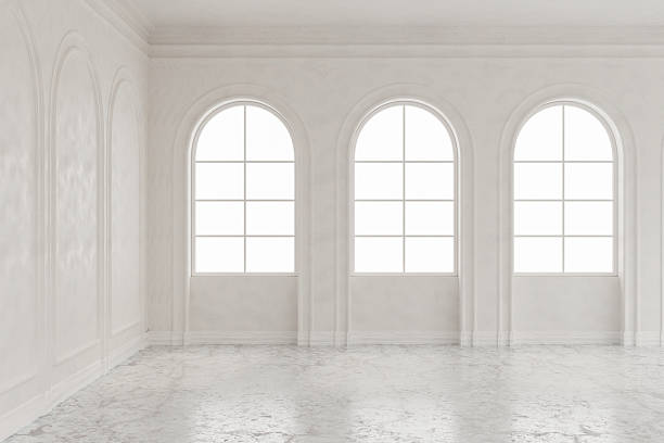 istock Modern luxury European white wall room and marble stone floor with sunlight through arched windows. 2241130503