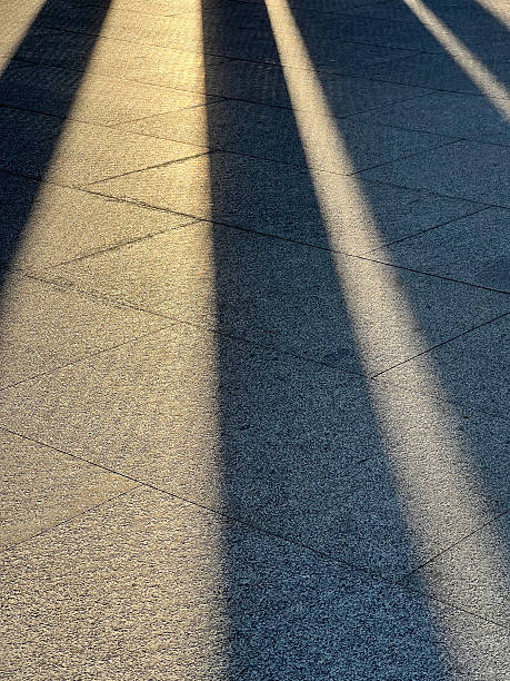 istock Abstract Shadows and Lights, rough concrete tile floor 2241131642