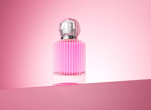 istock Luxurious pink perfume bottle with faceted cap against a soft pink backdrop. 3d illustration 2241133162