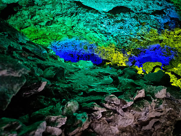 Iconic photo from inside the Kungur Ice Cave in Russia, showing illuminated ice formations, stalactites, and unique textures of the underground world. A famous natural landmark and popular tourist attraction representing geology, nature, and exploration.